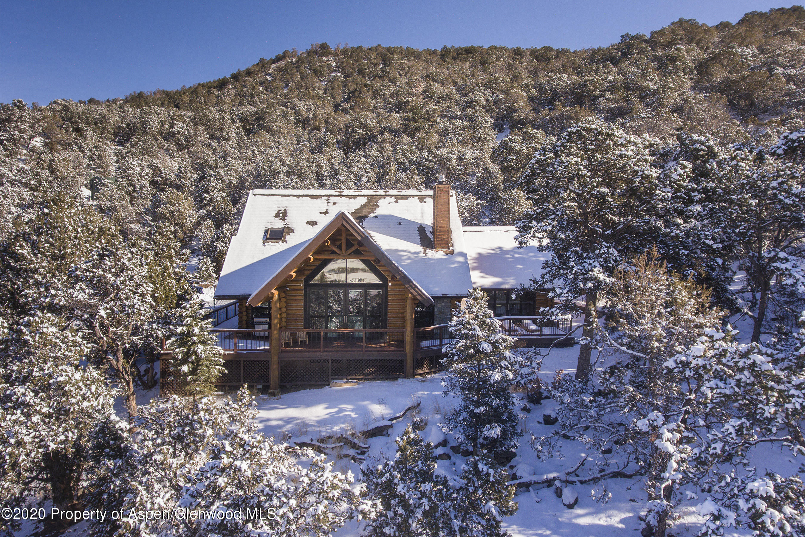 844 Hillcrest Drive Basalt, CO 81621 - Photo 25 of 27 a front view of a house with a yard