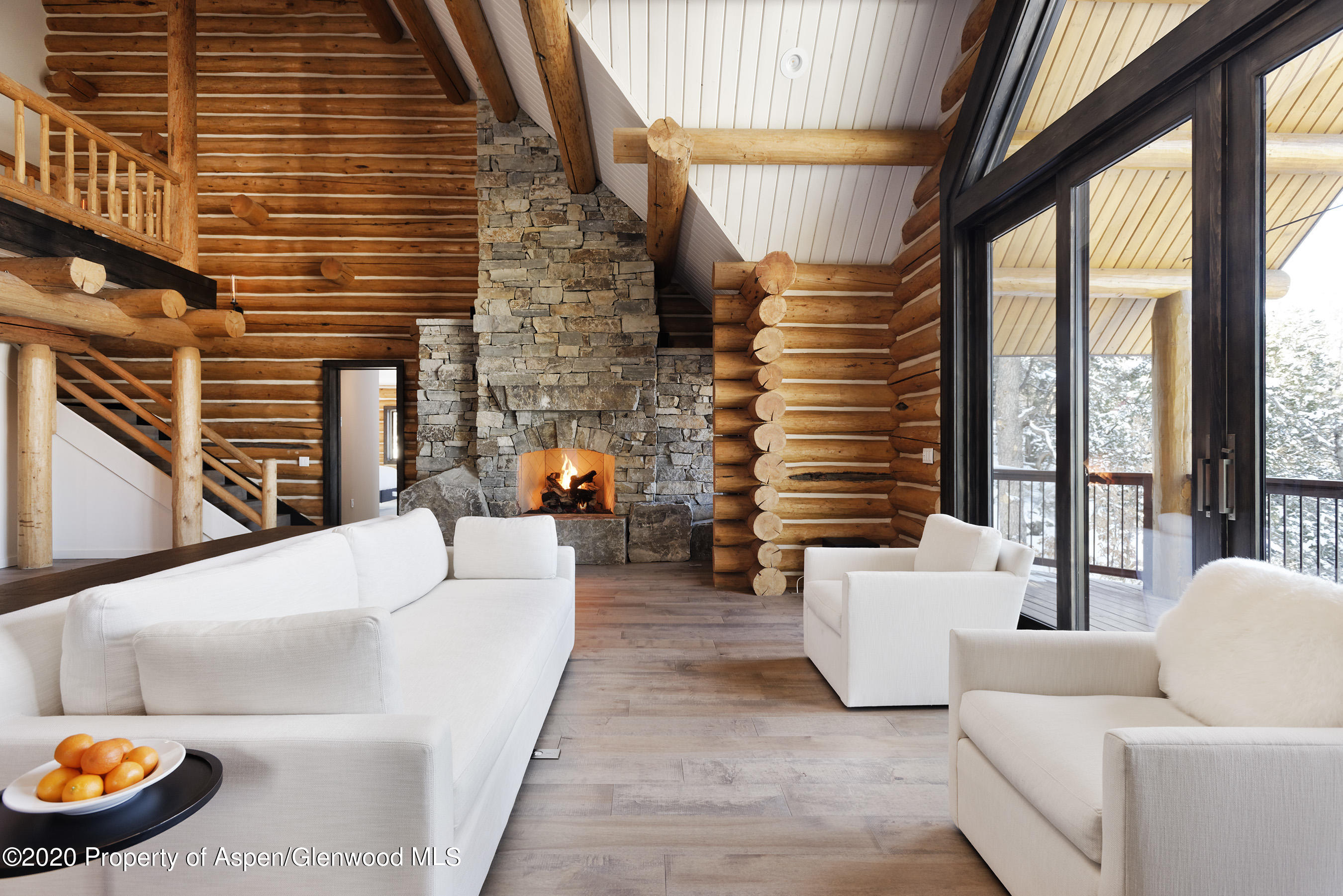 844 Hillcrest Drive Basalt, CO 81621 - Photo 6 of 27 a living room with furniture and a large window