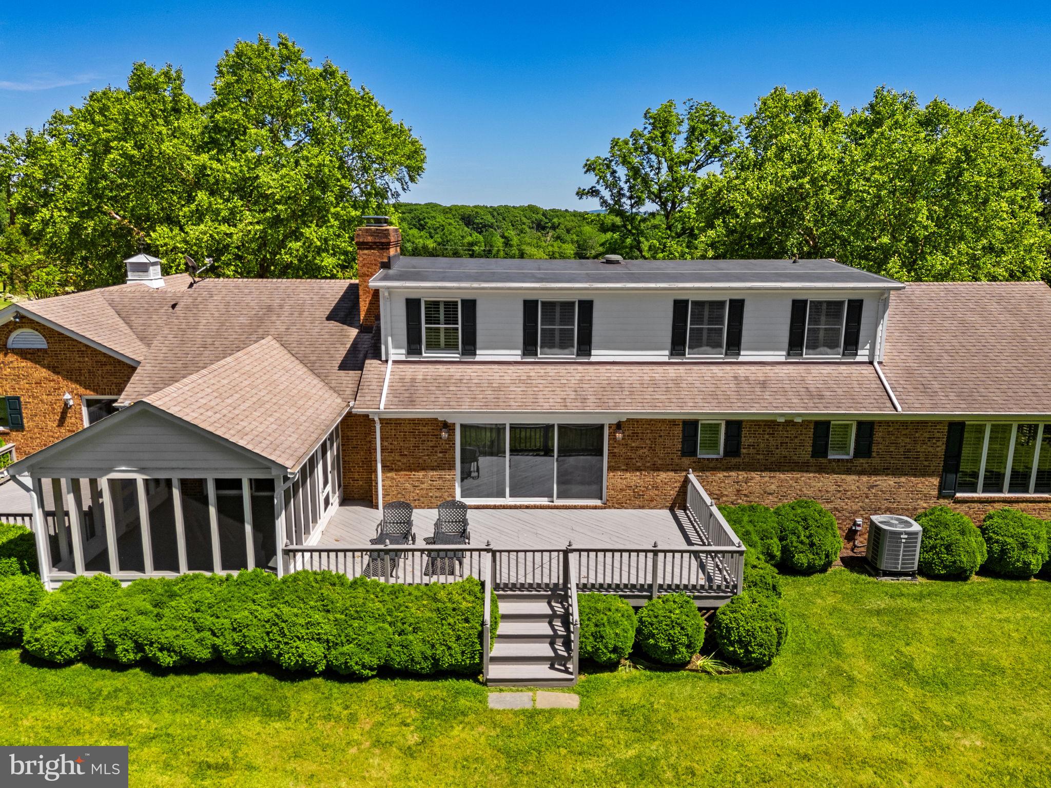 1310 Delaplane Grade Road Upperville, VA 20184 - Photo 45 of 94 View of back of house w/screened in porch & decks