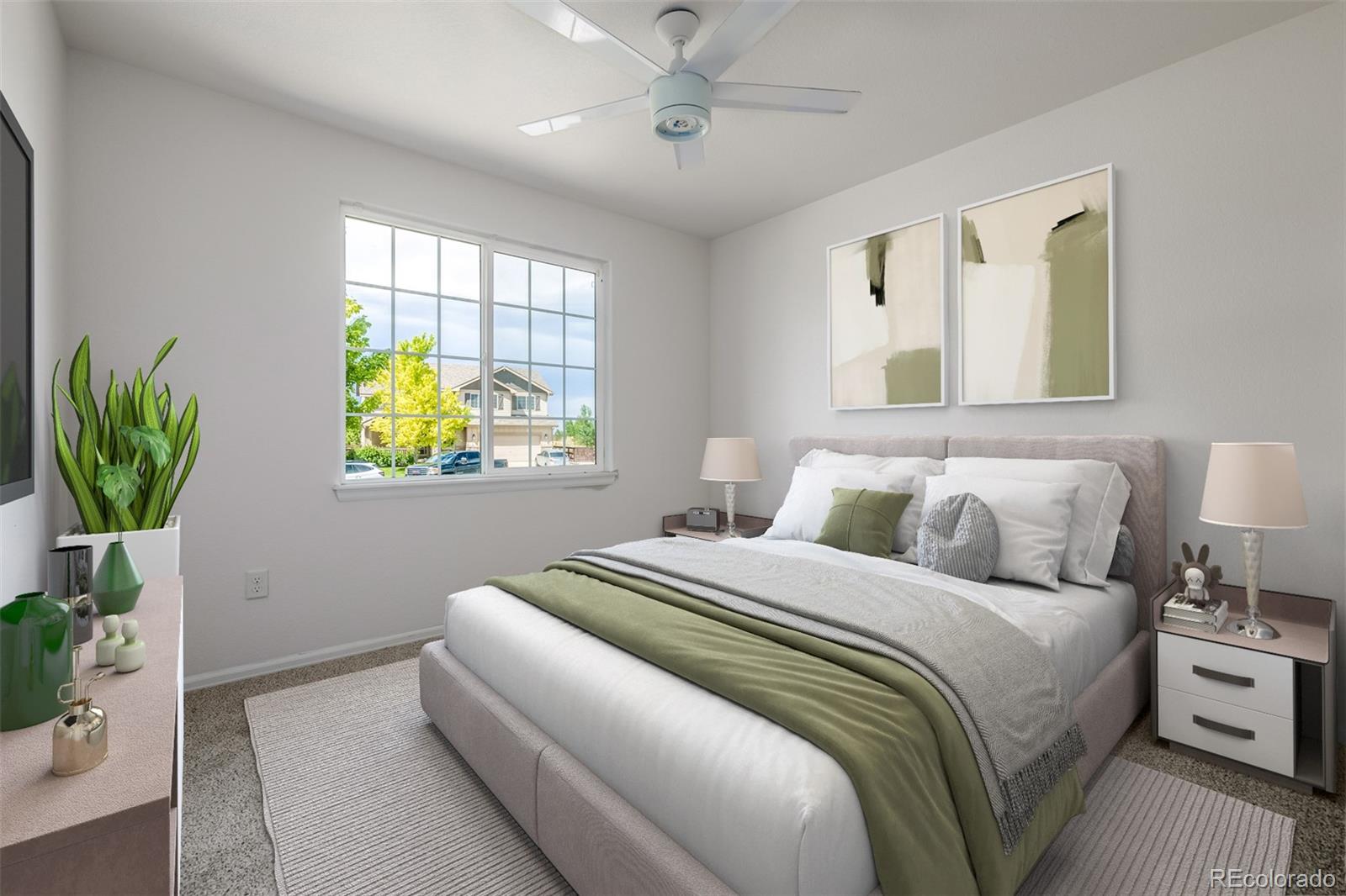 2188 Grain Bin Windsor, CO 80550 - Photo 15 of 30 a bedroom with a bed a chandelier and a potted plant