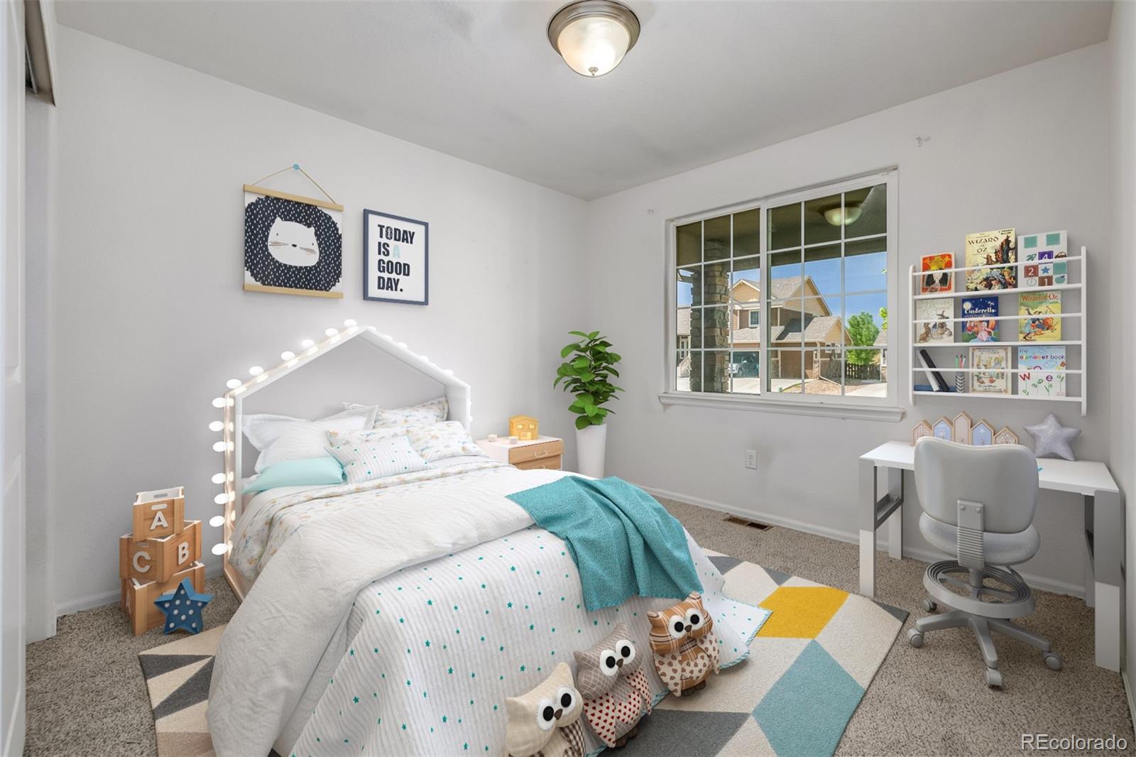 2188 Grain Bin Windsor, CO 80550 - Photo 16 of 30 a bedroom with a bed and a window