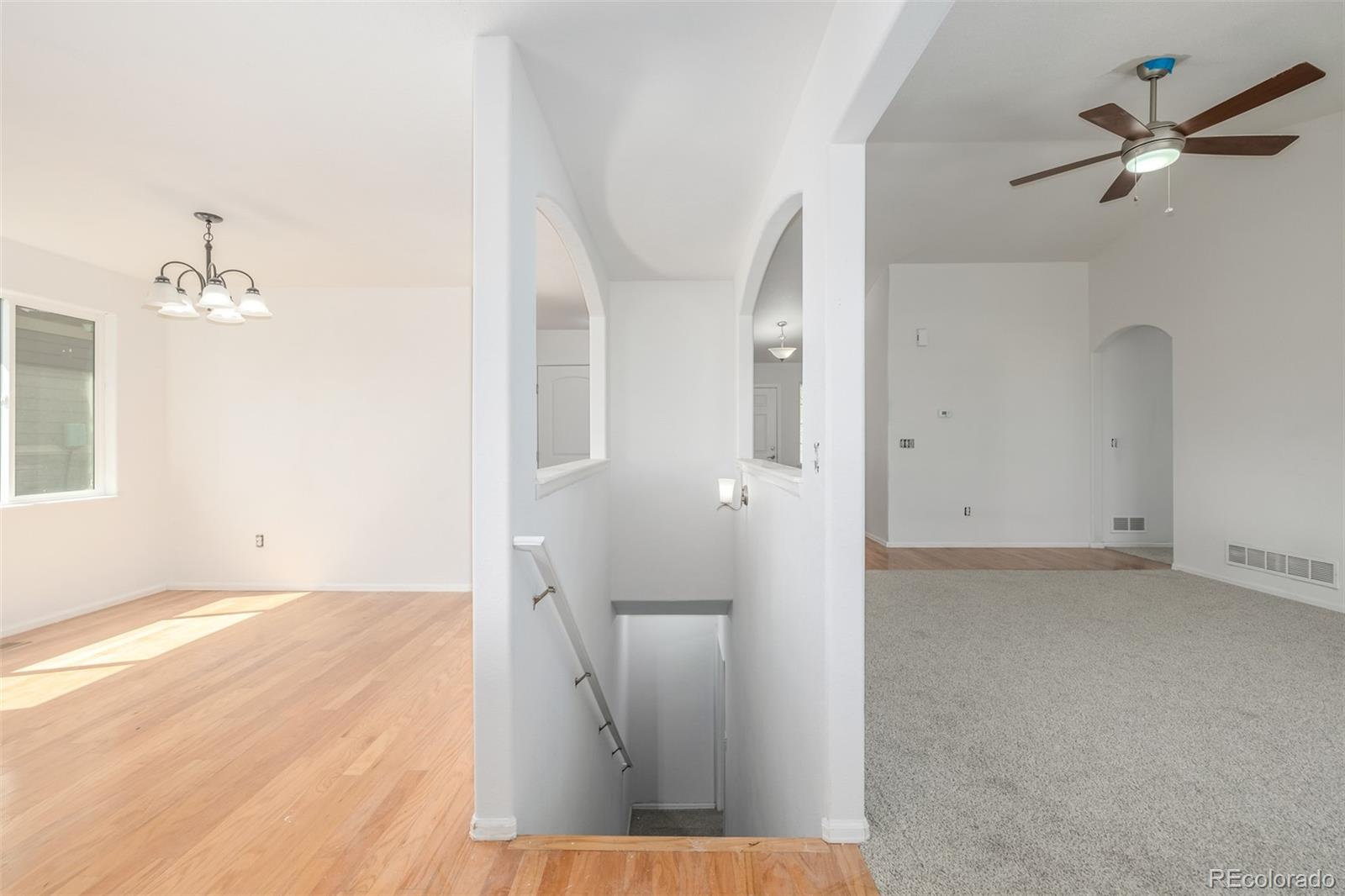 2188 Grain Bin Windsor, CO 80550 - Photo 18 of 30 wooden floor in an empty room