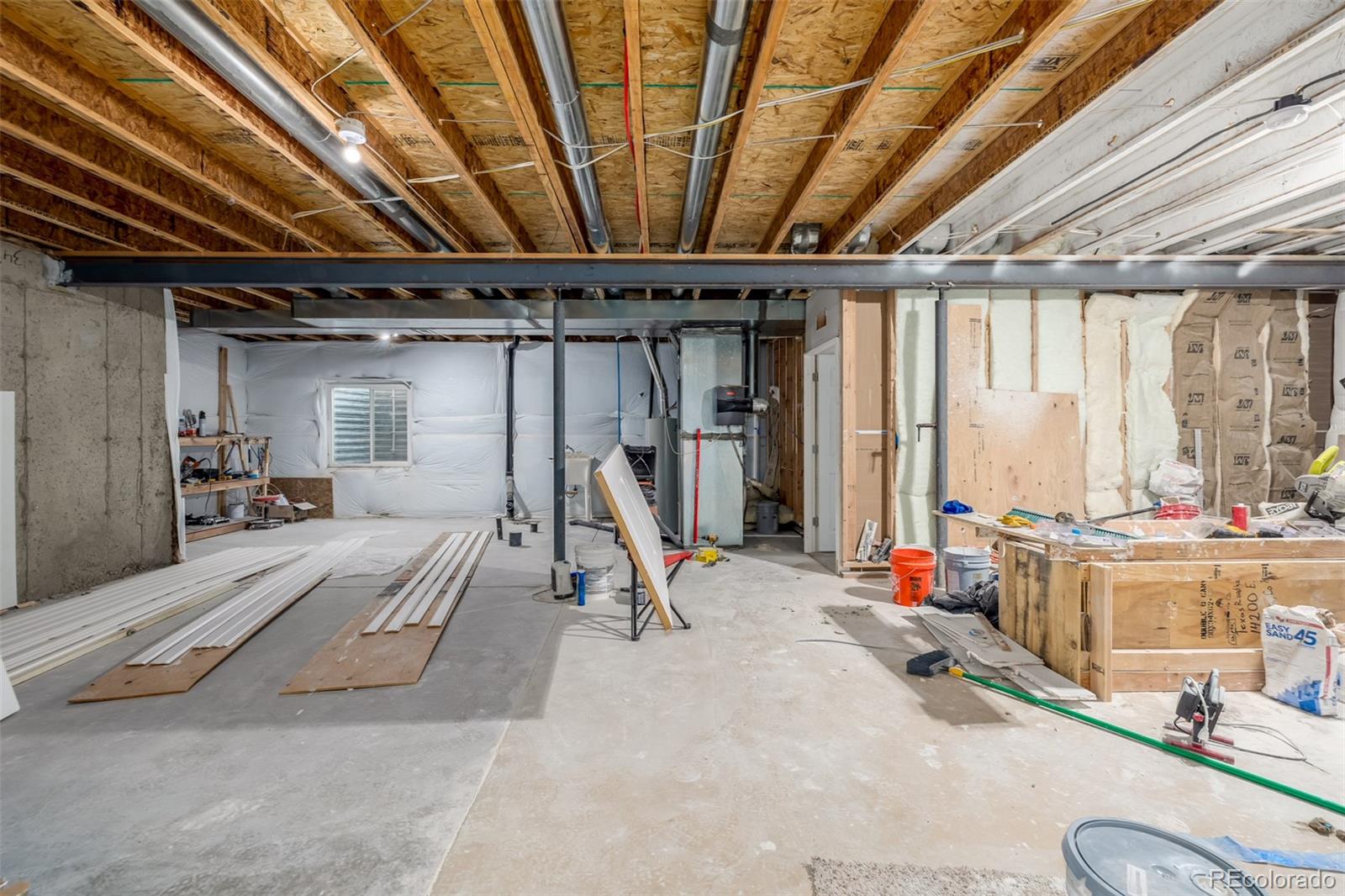 2188 Grain Bin Windsor, CO 80550 - Photo 21 of 30 a view of a room with gym equipment