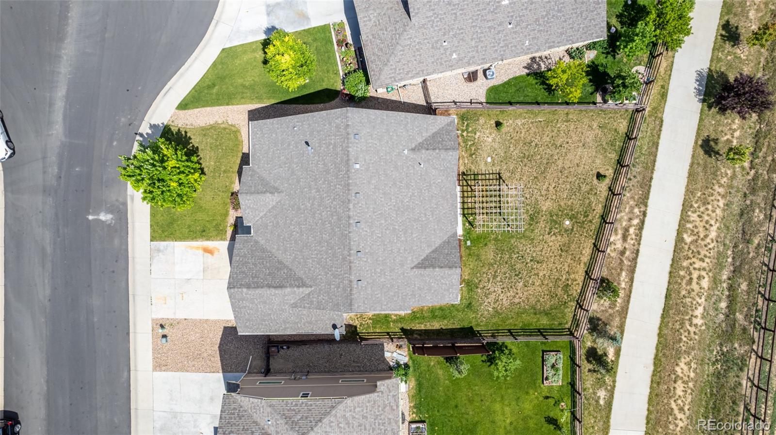 2188 Grain Bin Windsor, CO 80550 - Photo 27 of 30 an aerial view of a house with a backyard