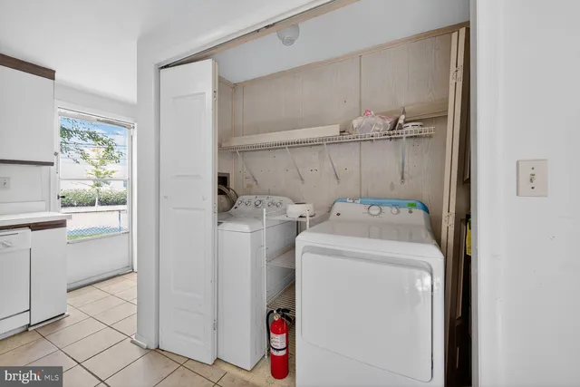 a utility room with dryer and washer