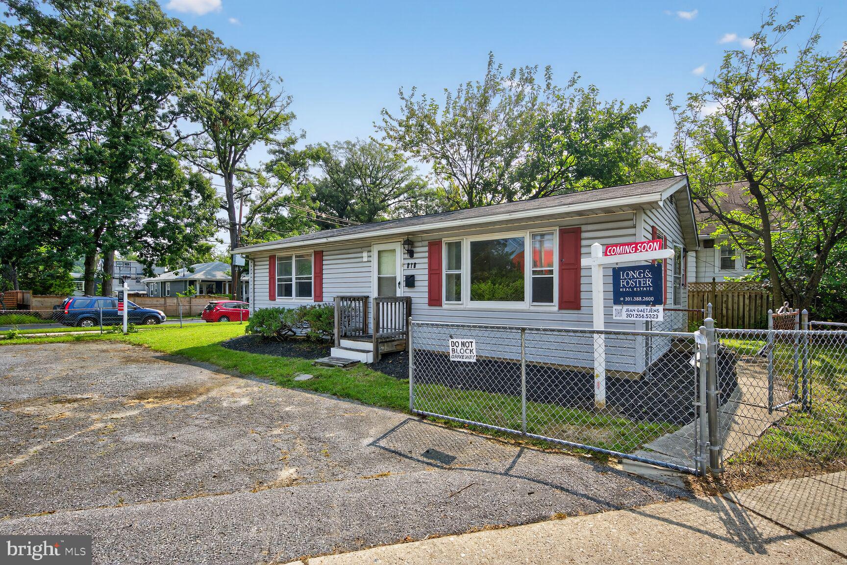 816 Islington Street Silver Spring, MD 20910 - Photo 15 of 18 a view of house with a yard and the street