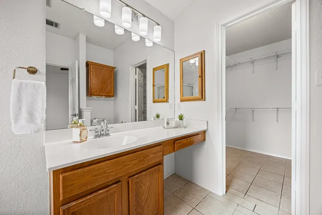 a bathroom with a tub and a shower