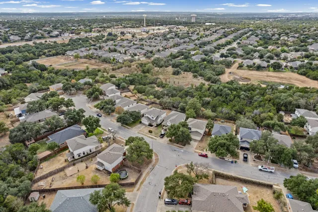 a view of city and green space