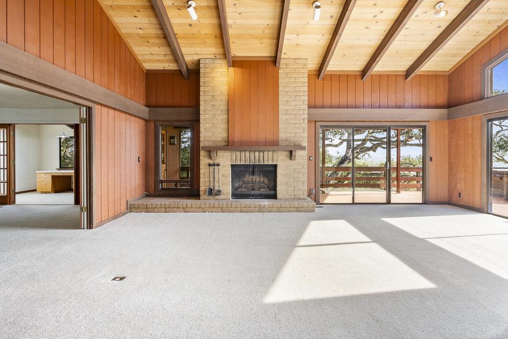 14104 Reservation Road Salinas, CA 93908 - Photo 12 of 56 a living room with furniture and a fireplace