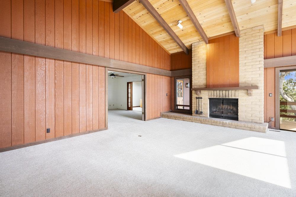 14104 Reservation Road Salinas, CA 93908 - Photo 13 of 56 a view of an empty room with a fireplace