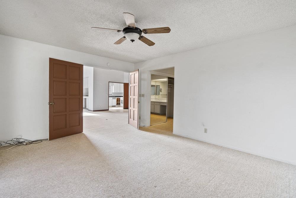 14104 Reservation Road Salinas, CA 93908 - Photo 25 of 56 an empty room with closet and windows