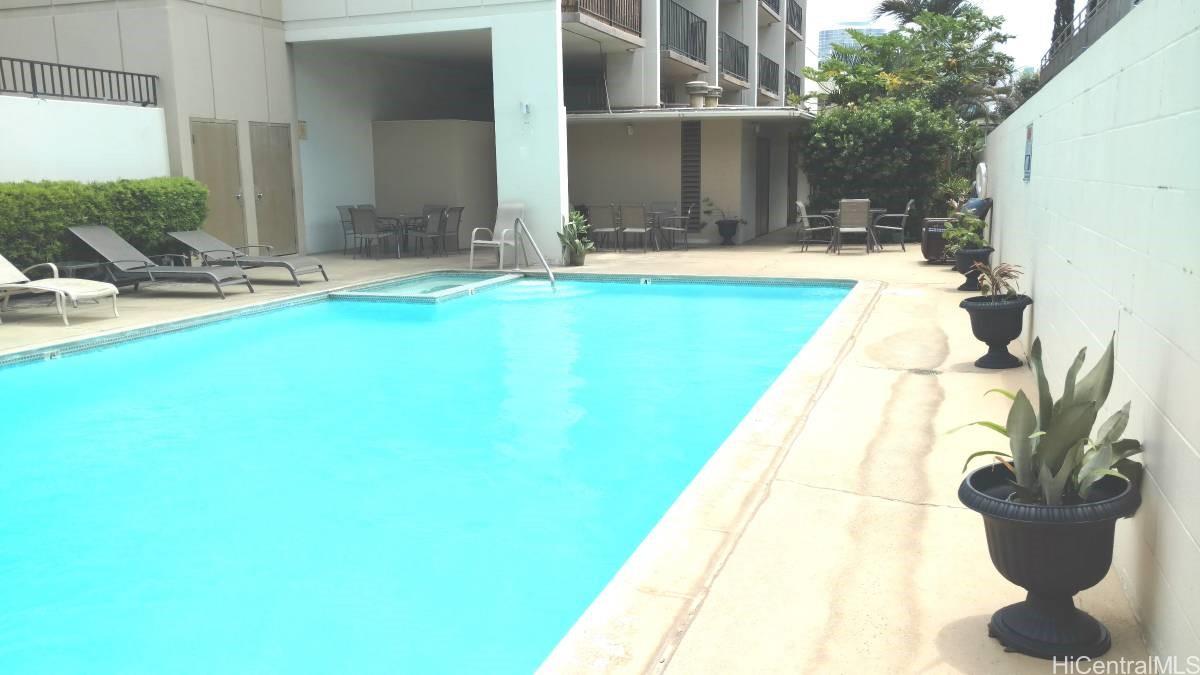 1112 Kinau Street, Unit 506 Honolulu, HI 96814 - Photo 4 of 12 a view of swimming pool with a lounge chair