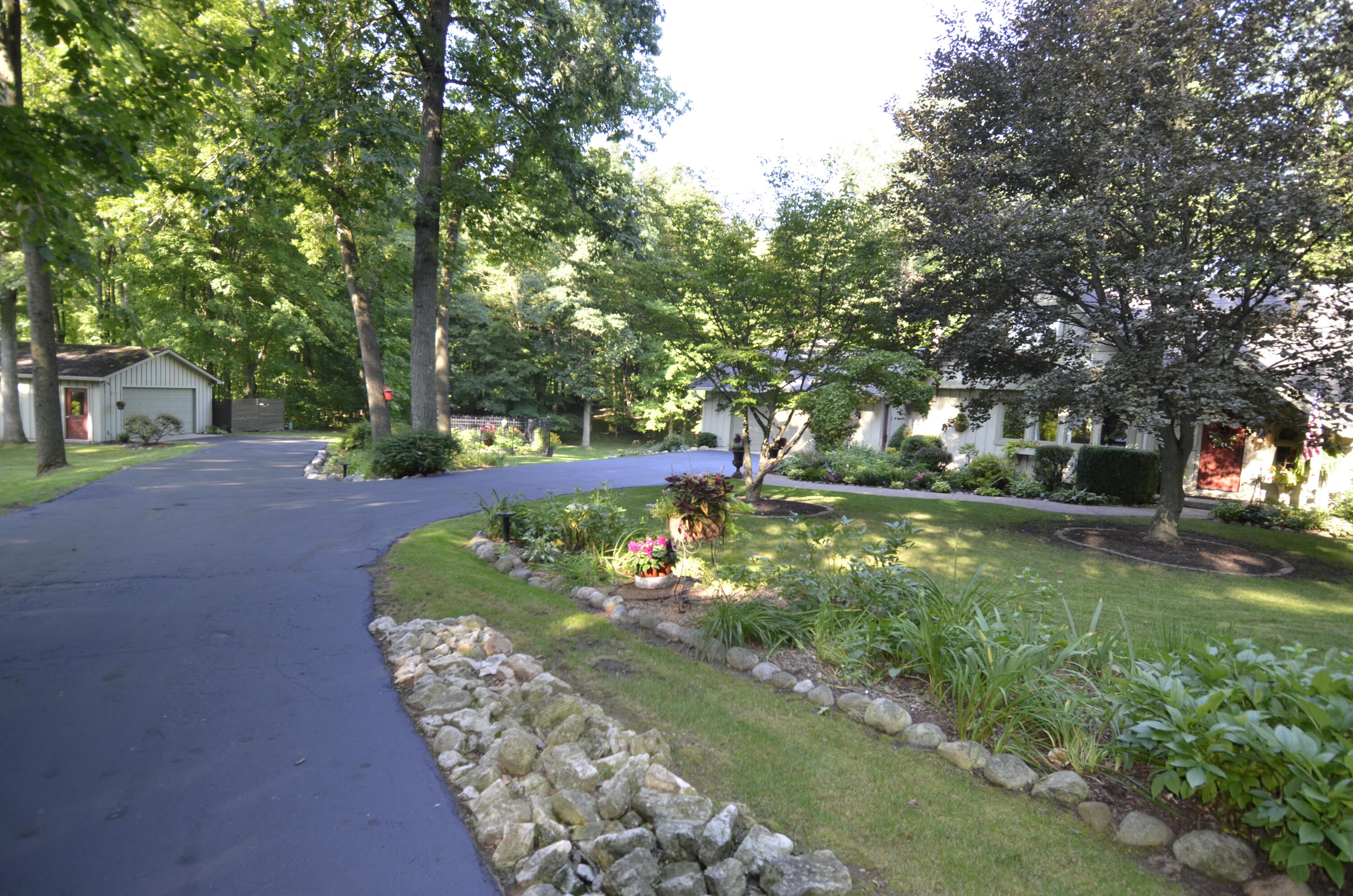 6900 Thorne Road Horton, MI 49246 - Photo 2 of 101 Thorne driveway landscape