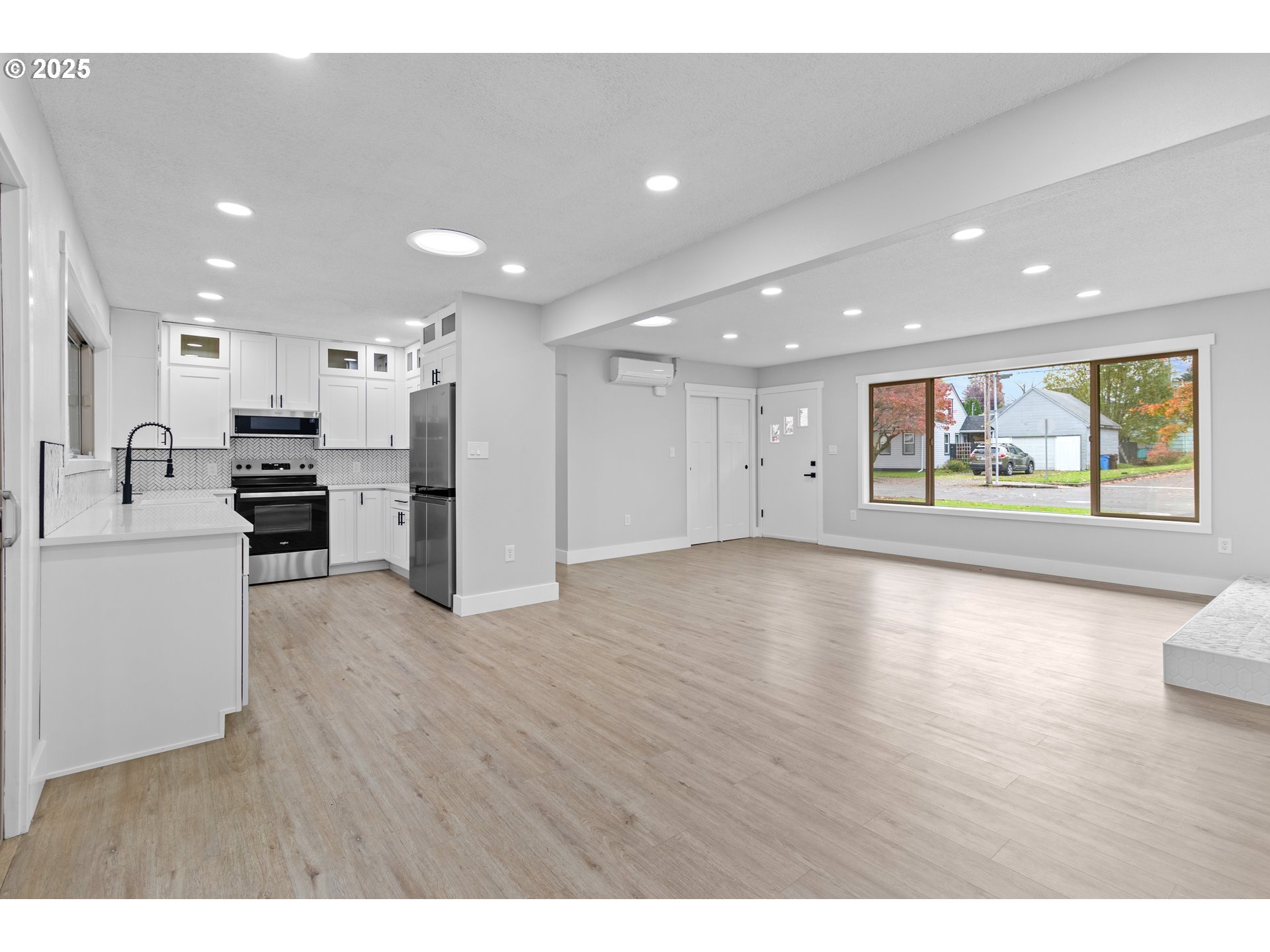 2859 Northeast 2nd Avenue Camas, WA 98607 - Photo 13 of 48 a view of kitchen with stainless steel appliances refrigerator oven and wooden floor