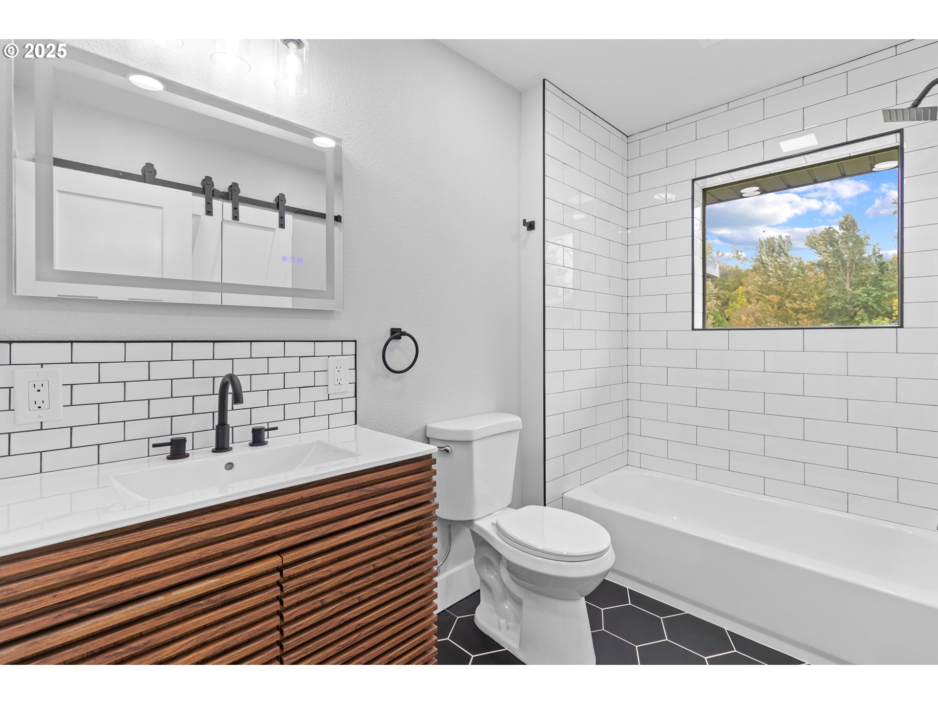 2859 Northeast 2nd Avenue Camas, WA 98607 - Photo 28 of 48 a bathroom with a sink a toilet and bathtub