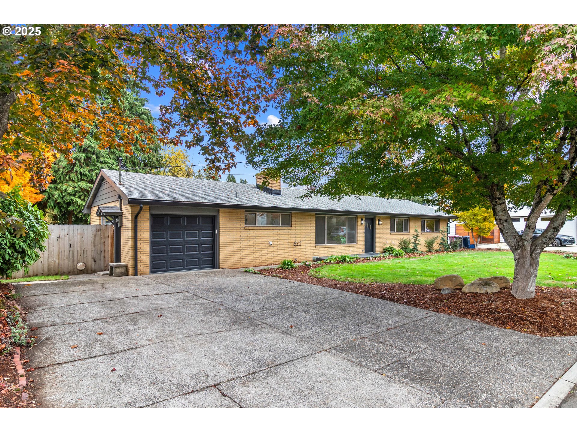 2859 Northeast 2nd Avenue Camas, WA 98607 - Photo 4 of 48 a front view of a house with a yard and a garage
