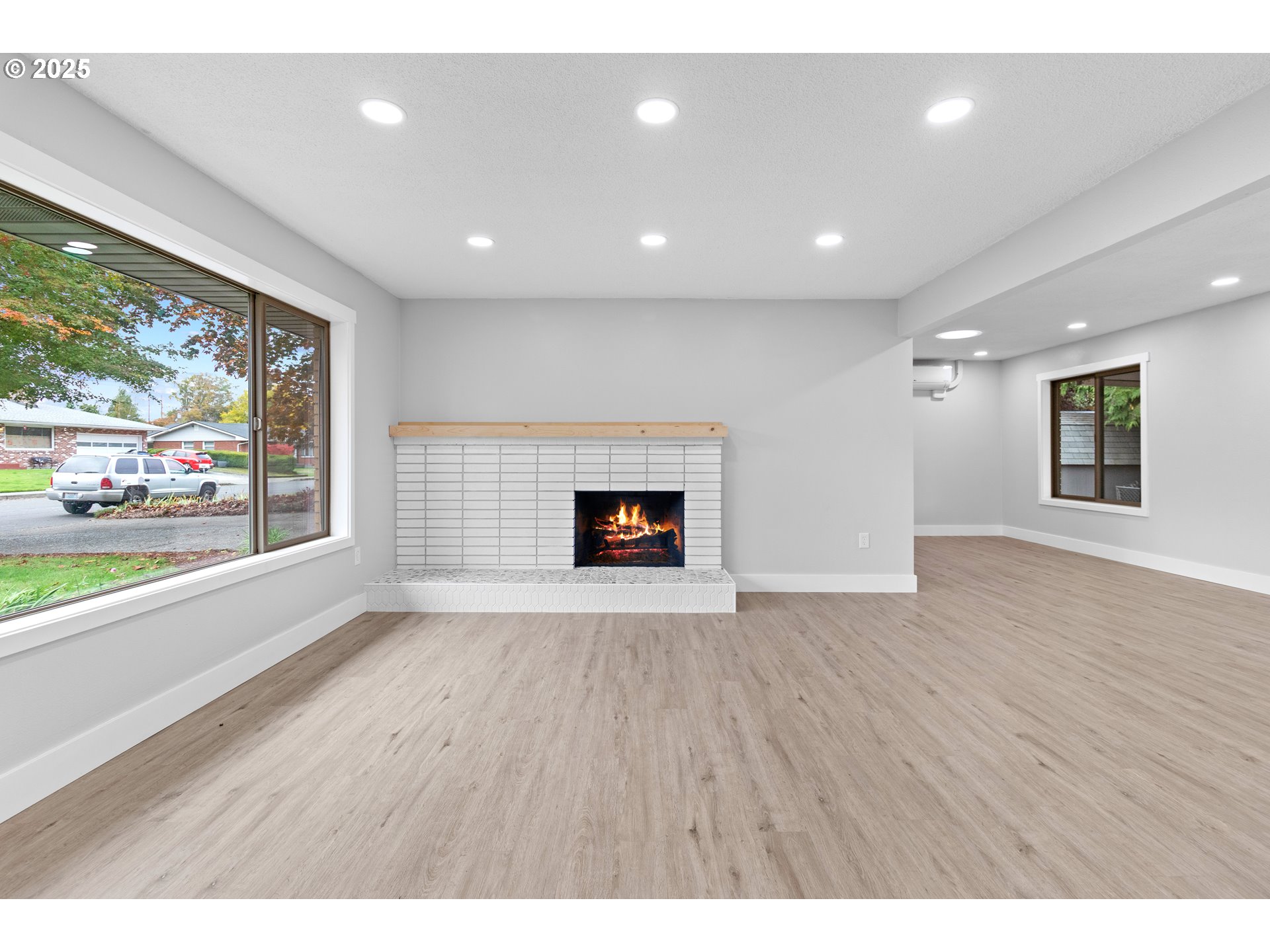 2859 Northeast 2nd Avenue Camas, WA 98607 - Photo 6 of 48 an empty room with wooden floor and windows
