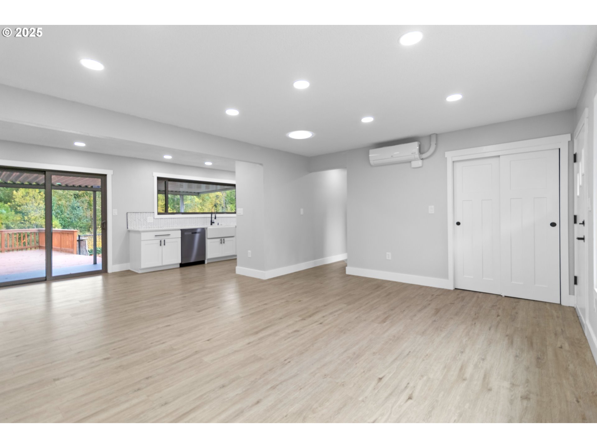 2859 Northeast 2nd Avenue Camas, WA 98607 - Photo 9 of 48 a view of empty room with wooden floor and windows