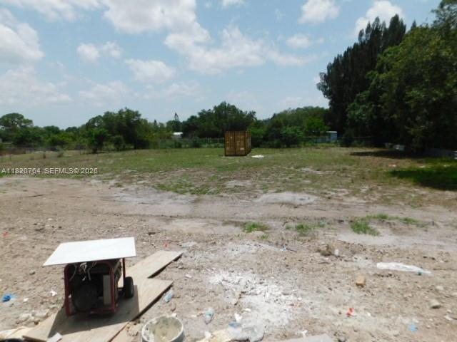 160 North Isora Street Clewiston, FL 33440 - Photo 15 of 26 a view of a yard with an outdoor space