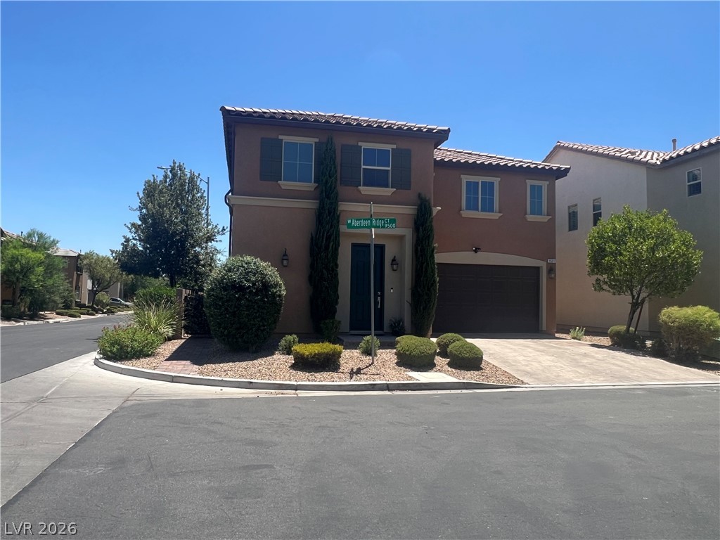 9581 Aberdeen Ridge Court Las Vegas, NV 89148 - Photo 1 of 25 A well-maintained street-level view of a house showcasing its curb appeal.