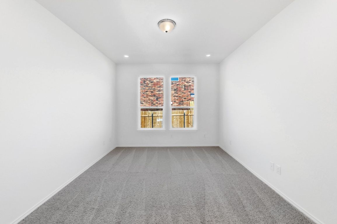 Undisclosed Address Manor, TX 78653 - Photo 15 of 31 an empty room with windows