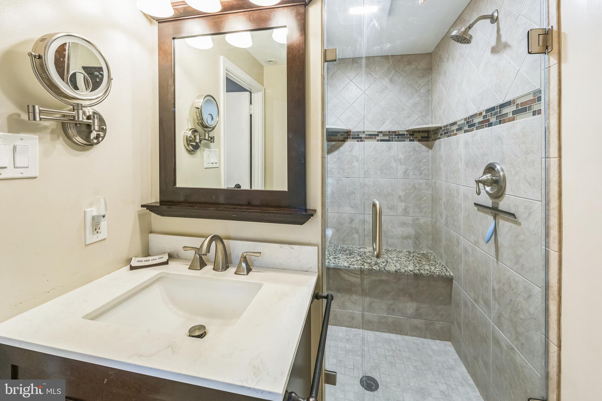 580 Gregory Lane Devon, PA 19333 - Photo 11 of 26 a bathroom with a sink and a mirror