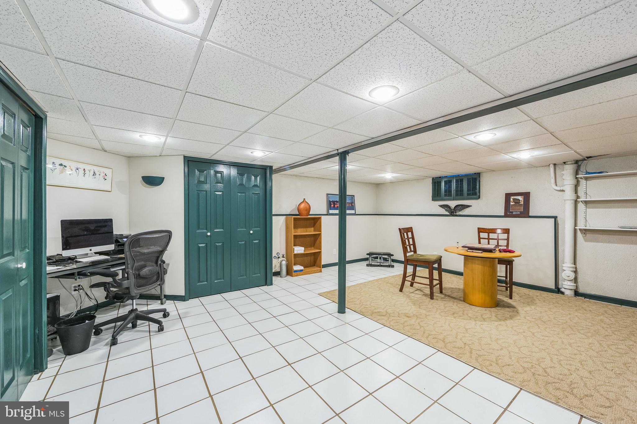 580 Gregory Lane Devon, PA 19333 - Photo 17 of 26 a kitchen with stainless steel appliances kitchen island granite countertop a refrigerator and a stove top oven