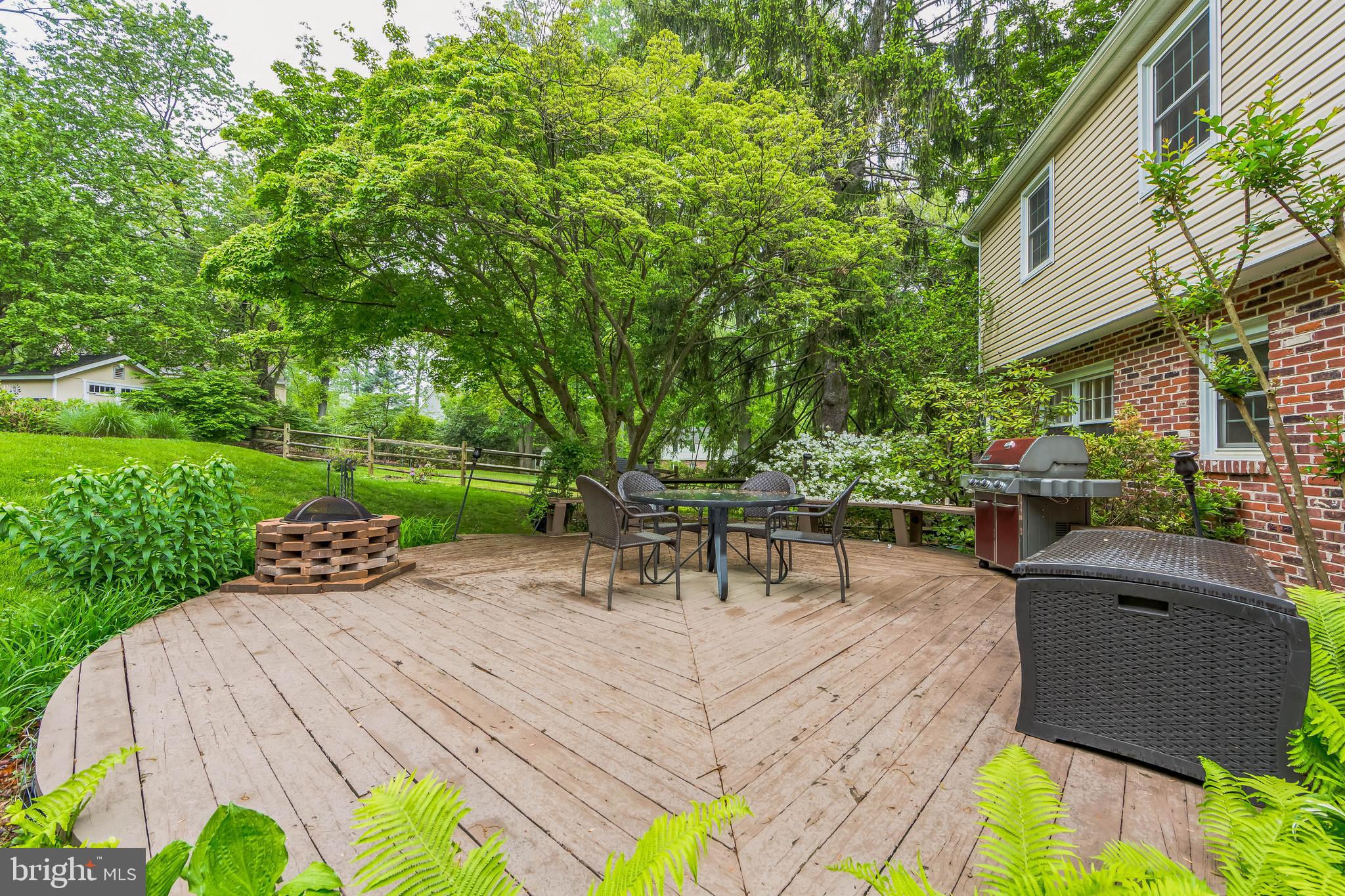 580 Gregory Lane Devon, PA 19333 - Photo 21 of 26 a view of backyard with outdoor seating and green space
