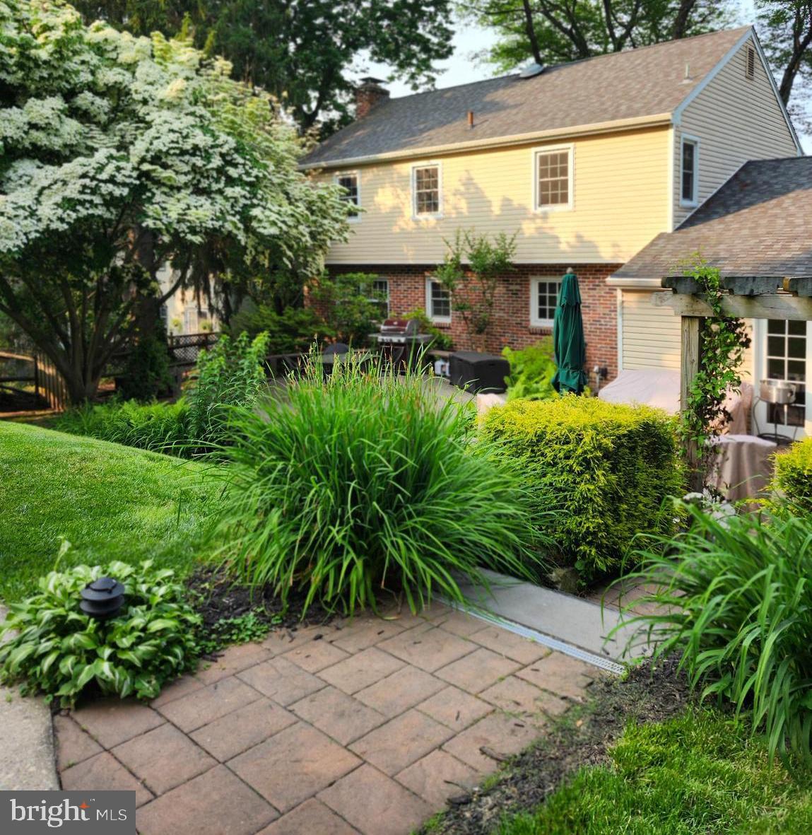 580 Gregory Lane Devon, PA 19333 - Photo 24 of 26 a view of a chair and tables in the patio of the house