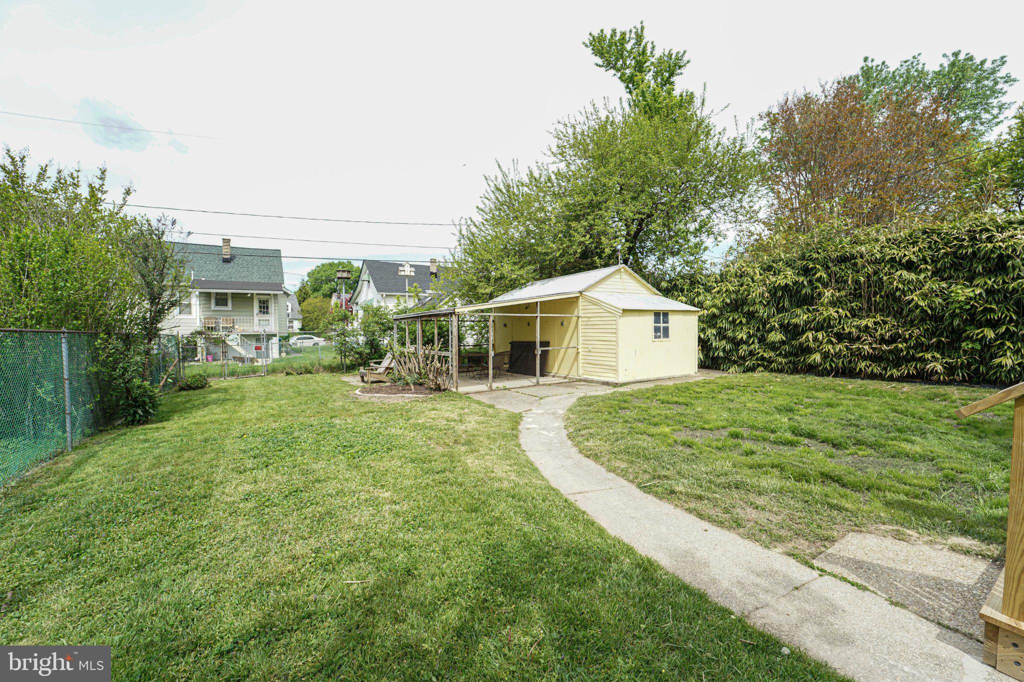 5312 Catalpha Road Baltimore, MD 21214 - Photo 3 of 59 a front view of house with yard and green space