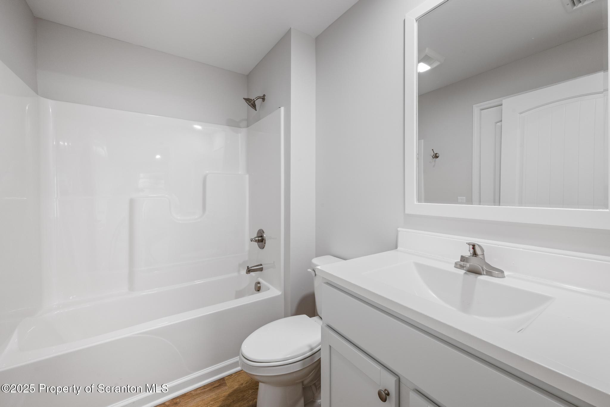 45 Zackery Way Old Forge, PA 18518 - Photo 21 of 26 a bathroom with a sink toilet and a bathtub