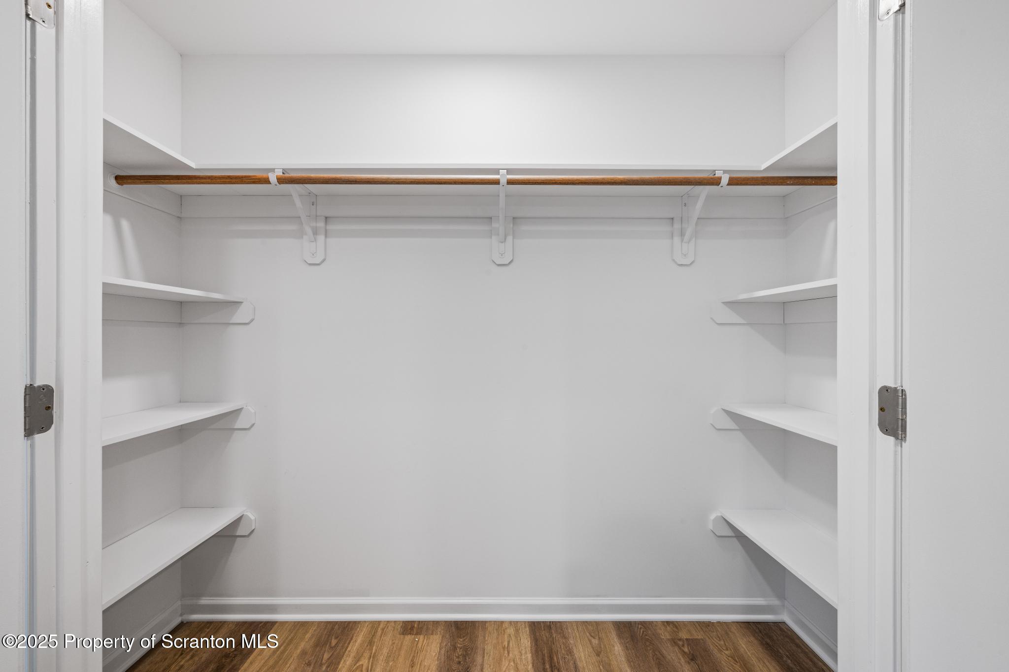 45 Zackery Way Old Forge, PA 18518 - Photo 23 of 26 a view of walk in closet with empty racks