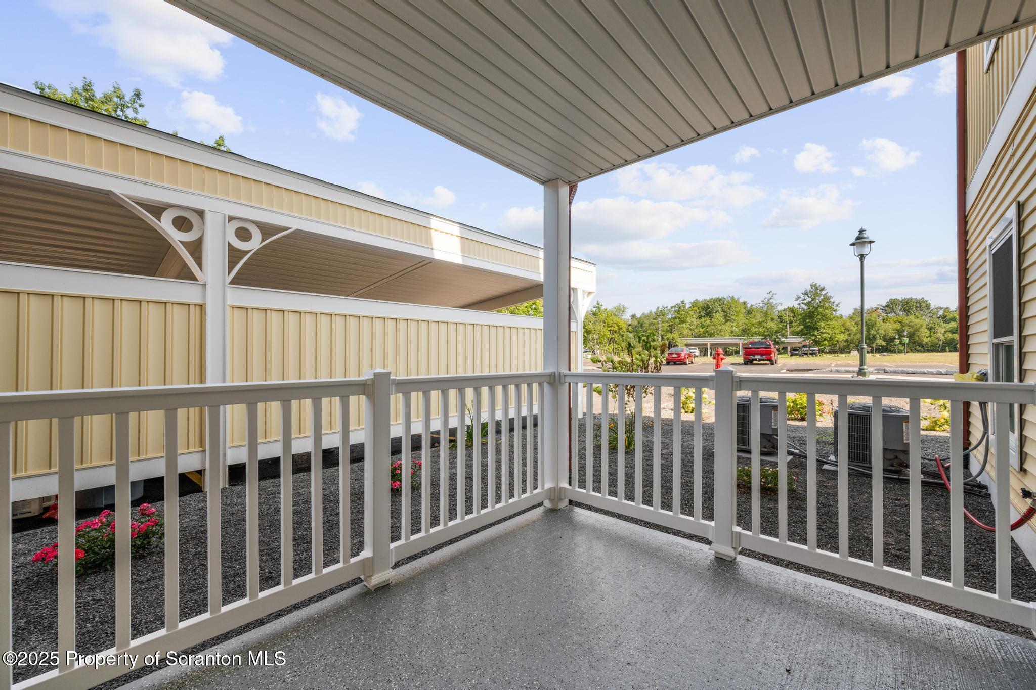 45 Zackery Way Old Forge, PA 18518 - Photo 25 of 26 a view of a balcony