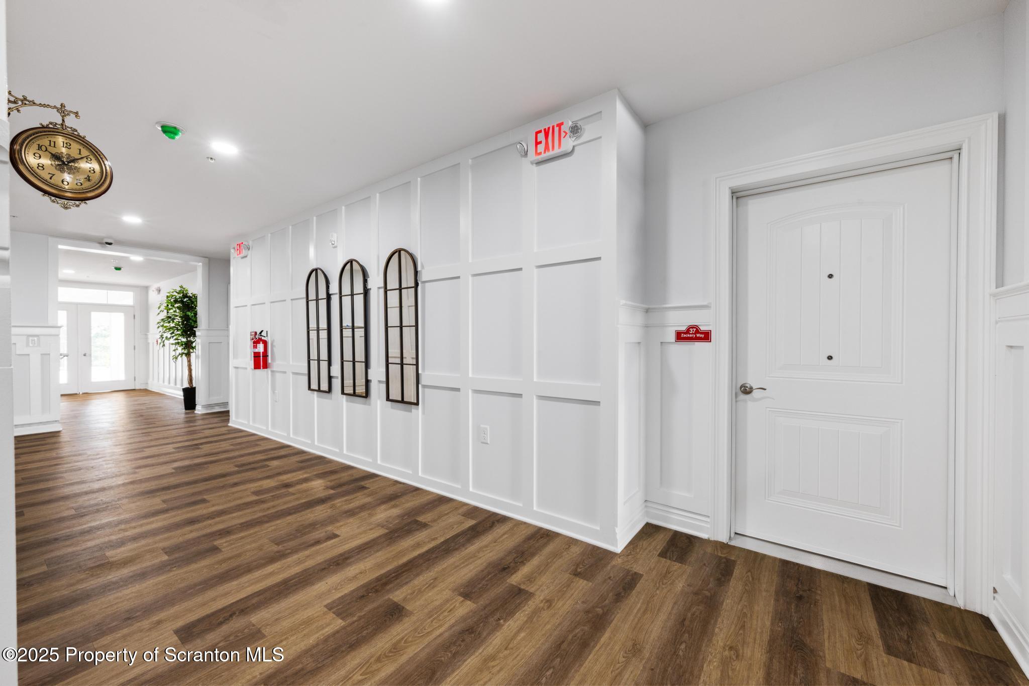 45 Zackery Way Old Forge, PA 18518 - Photo 7 of 26 a view of an entryway with wooden floor