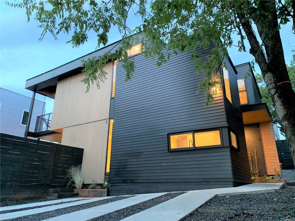 a view of a house with a garage
