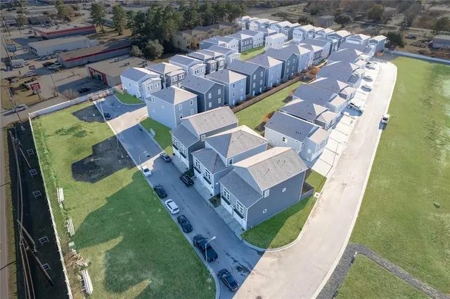 an aerial view of a house with a garden