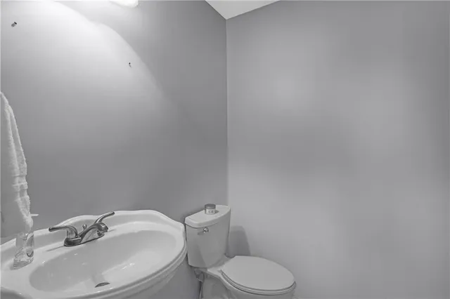 a bathroom with a sink and a toilet