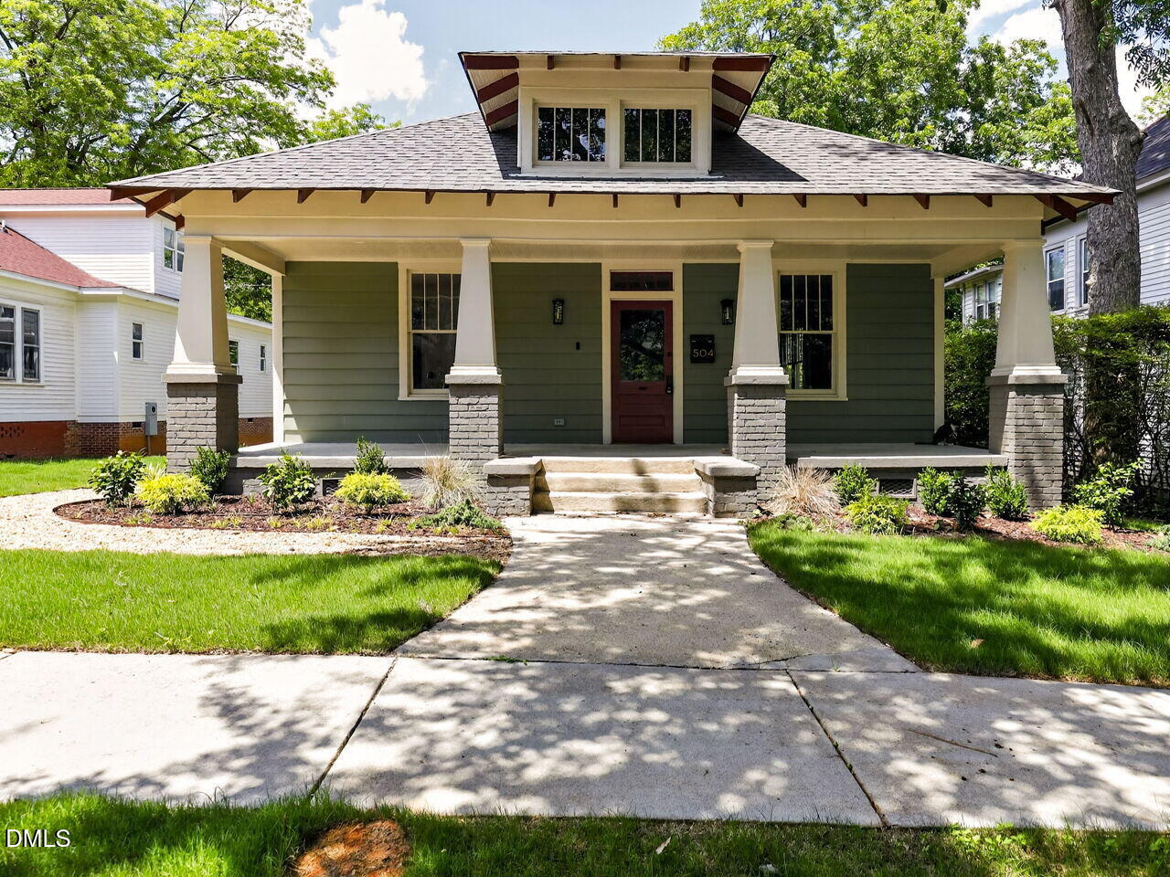 504 Tilden Street Raleigh, NC 27605 - Photo 15 of 58 a front view of a house with yard and green space
