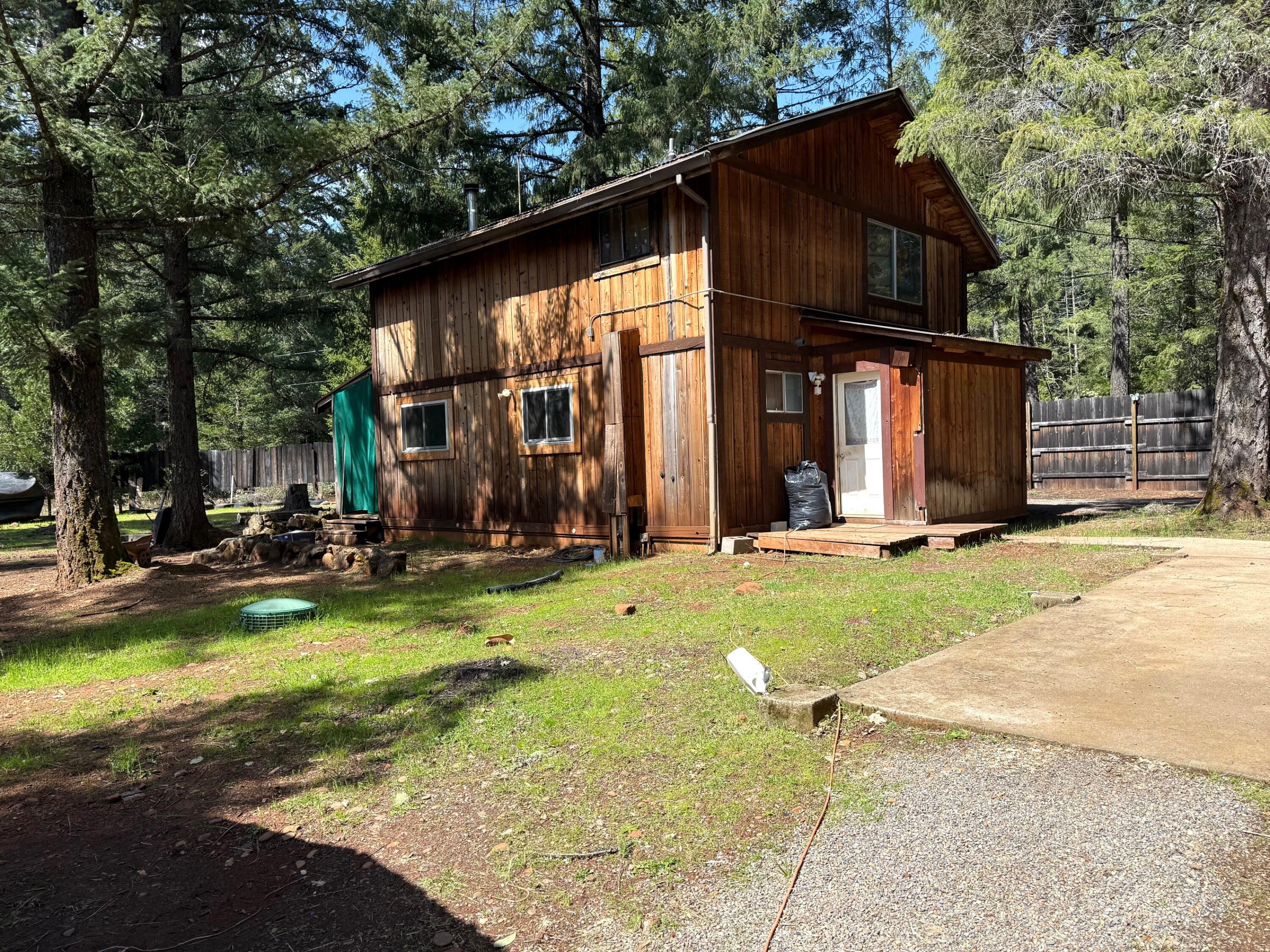 765 Lone Mountain Road O'Brien, OR 97534 - Photo 3 of 16 the home has a circular driveway for quick in and out from property.