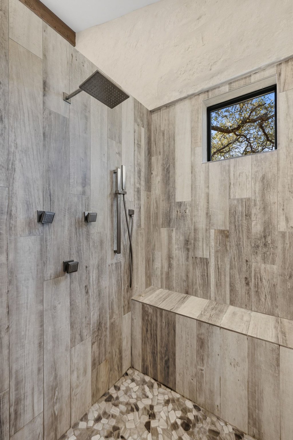 1660 Windmill Run Wimberley, TX 78676 - Photo 15 of 40 a bathroom with a shower