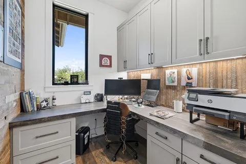 a view of a livingroom with furniture and a fireplace