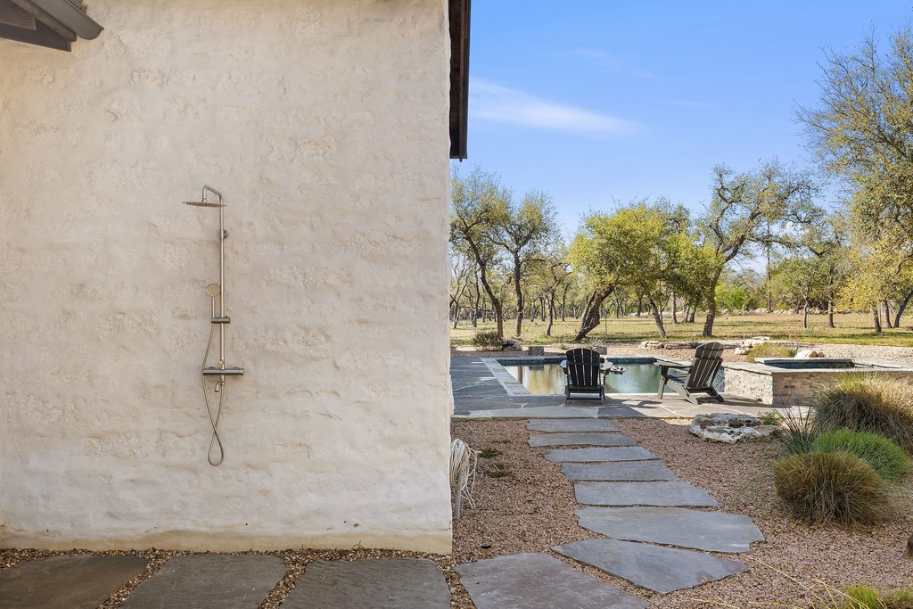 1660 Windmill Run Wimberley, TX 78676 - Photo 29 of 40 a view of a yard with plants