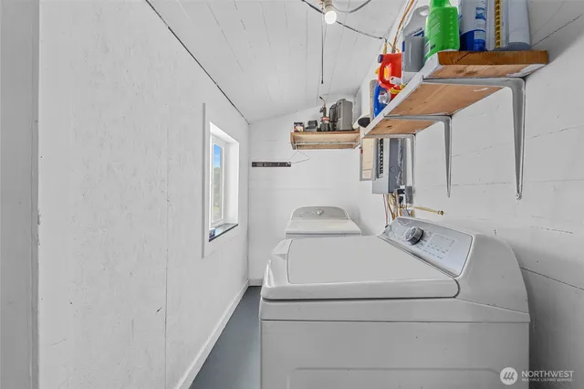 a utility room with dryer and washer