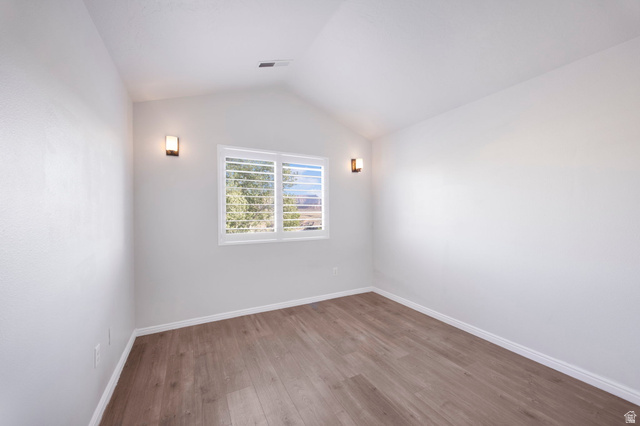 1440 West 100 South Virgin, UT 84779 - Photo 27 of 45 Vaulted ceilings complemented by wood-finish flooring