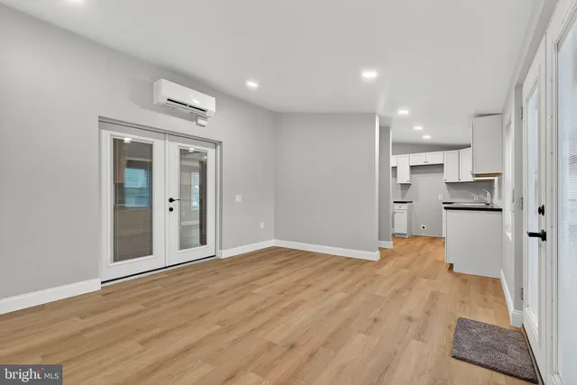 a view of kitchen with wooden floor