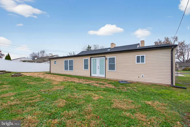 a view of a backyard of the house