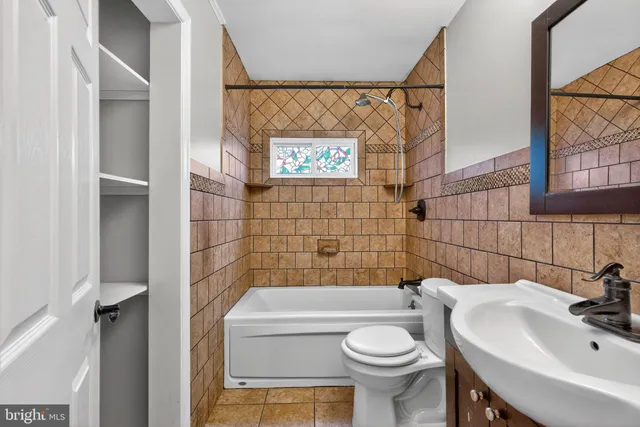 a bathroom with a sink and a toilet