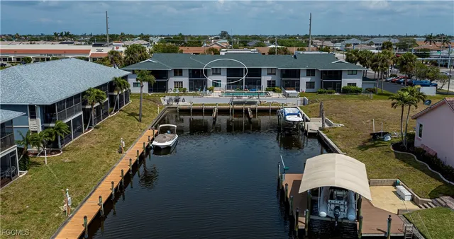 an aerial view of a building with outdoor space