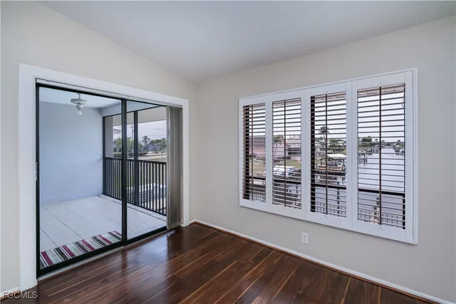 a kitchen with a sink cabinets and appliances