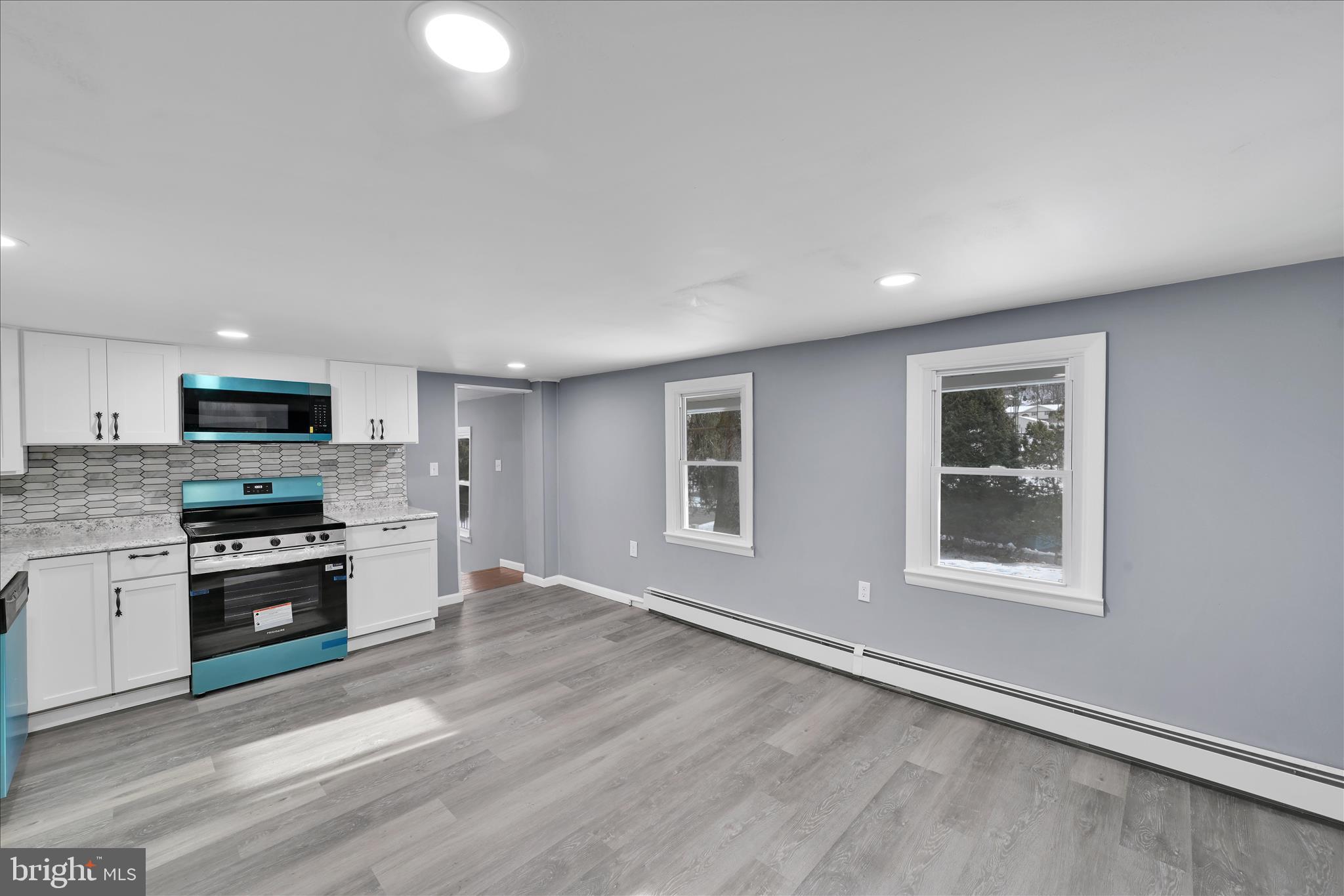 2 Edgar Lewis Street Minersville, PA 17954 - Photo 17 of 29 a large kitchen with stainless steel appliances granite countertop a stove and a refrigerator